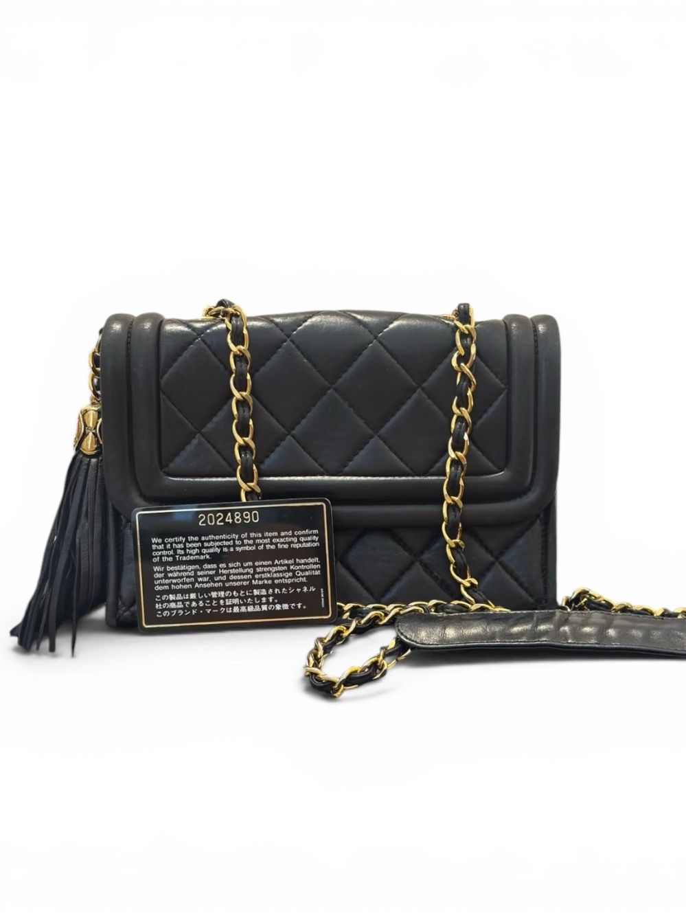 CHANEL quilted lambskin tassel flap bag